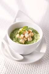 green cream, soup with croutons  