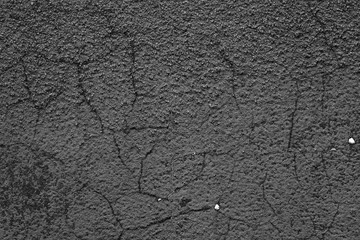 Wall fragment with scratches and cracks