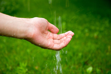 Water being poured on a hand