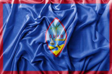 Ruffled waving United States Guam flag