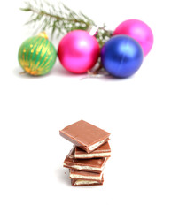 Broken yoghurt chocolate bars on white