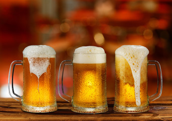 cold light beer glass mug in a pub