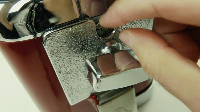 Old retro candy vending machine in use. Inserting a coin.