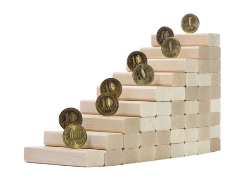 wooden game jenga tower on a white background
