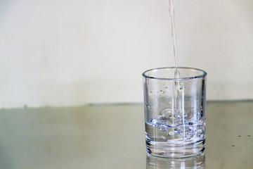 Pour the drink into a glass