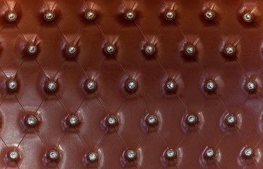 Vintage dark brown leather sofa texture with jewelry background - luxury classic chocolate color leather and jewelry texture - Vintage luxury background