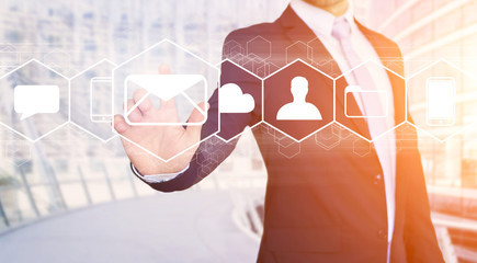 Businessman touching technology interface with business email ic