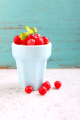 cranberries in a blue cup