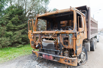 Fototapeta na wymiar truck completely burned on the roadside