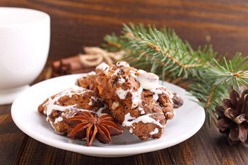 chocolate cookies with nuts, raisins and icing