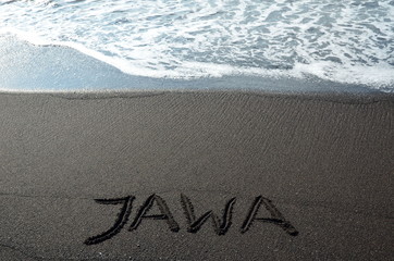 Java signe on beach