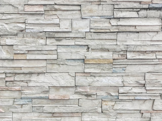 Closeup surface brick pattern at old stone brick wall textured background