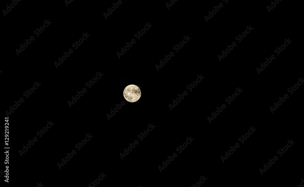 Wall mural close up of full moon on dark sky background