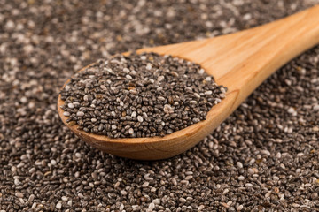 Chia seeds in wooden spoon