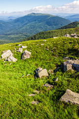 Fototapeta na wymiar huge stones in valley on top of mountain range