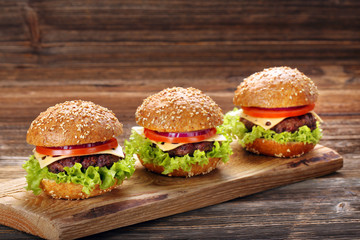 Hamburger with beef meat and fresh vegetables