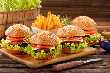 Hamburger with beef meat and fresh vegetables