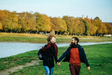 Young couple in autumn park