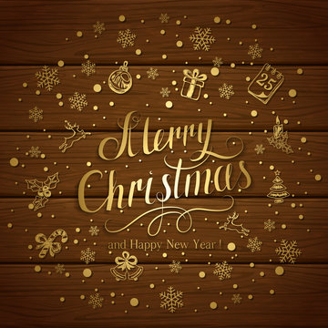 Golden Christmas decorations on brown wooden background