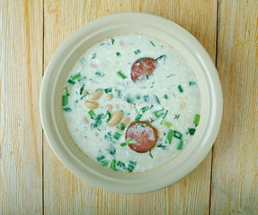 Soup with beans, sour cream and sausage