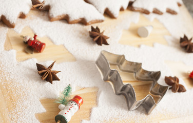 christmas gingerbread cookies baking process , dough and rolling pin,shallow depth of field.