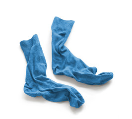 Clean laundered men's socks on a white background