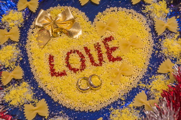 heart with the word love made of flour products