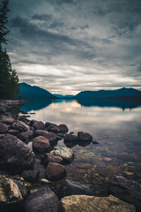 Obraz premium Lake McDonald on overcast day. [Portrait]