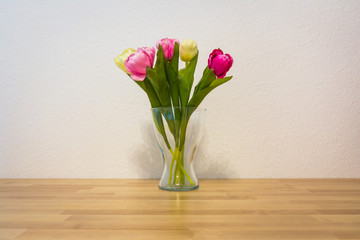 Pink Yellow Tulips Wooden Table White Wall Glass Vase