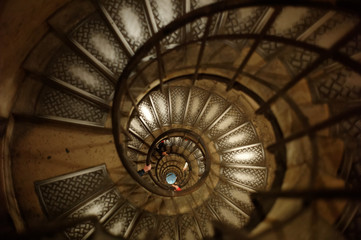 spiral staircase with hands