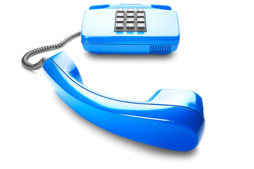 Landline phone in blue on isolated white background with shadow