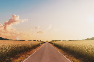 straight road in landscape beautiful sunset sky