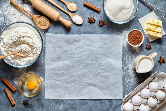 Dough preparation recipe homemade bread, pizza or pie ingridients, food flat lay on kitchen table background. Working with butter, milk, yeast, flour, eggs, sugar pastry or bakery cooking. Text space