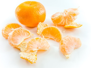 Fototapeta na wymiar group of ripe mandarin fruit slices on white 