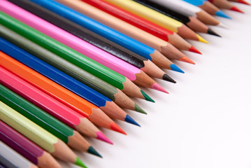     palette of multicolored slim crayons side view 