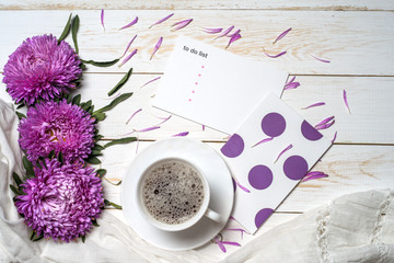 Word relax with cup of coffee and pink flowers
