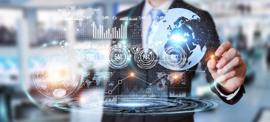 Businessman using hologram screen with digital data