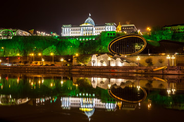 Fototapeta na wymiar Georgia, Tbilisi night . View from the right bank of the Kura Ri