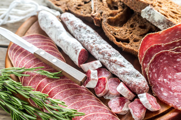 Different kinds of salami with dark-rye bread