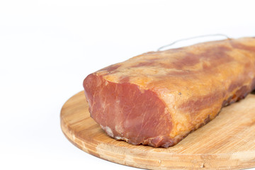 Smoked pork sirloin isolated over white background