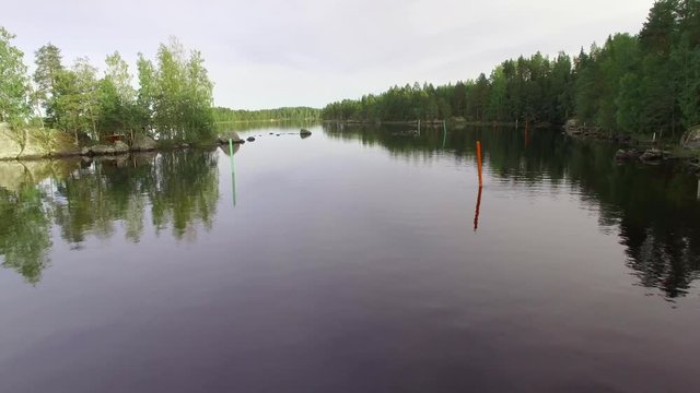 Moving trough lateral seamarks at a waterway at a lake in Finland