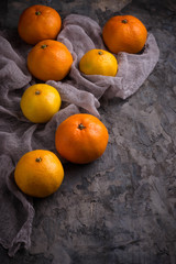 Sweet orange tangerines on concrete background