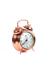 copper old style alarm clock isolated on white
