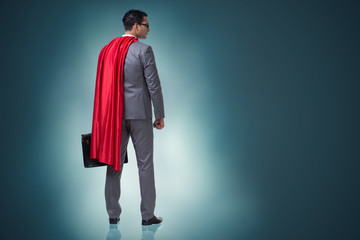 Businessman in superhero concept with red cover