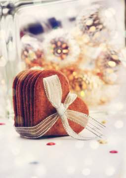 Christmas treats, gingerbread cookies art decoration with bokeh lights, beautiful festive toned image, selective focus
