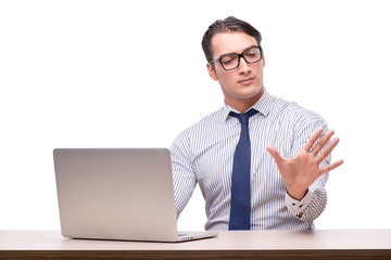 Handsome businessman working with laptop computer isolated on wh