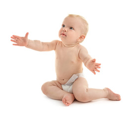 Baby sitting on white background