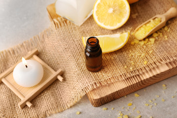 Beautiful spa composition with lemon essential oil, closeup