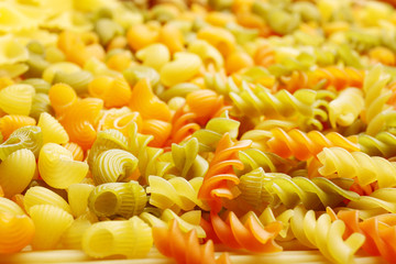 Raw pasta background, closeup