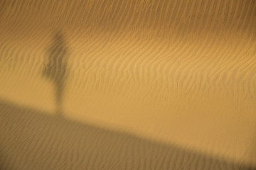 Shadow on the sand dunes
